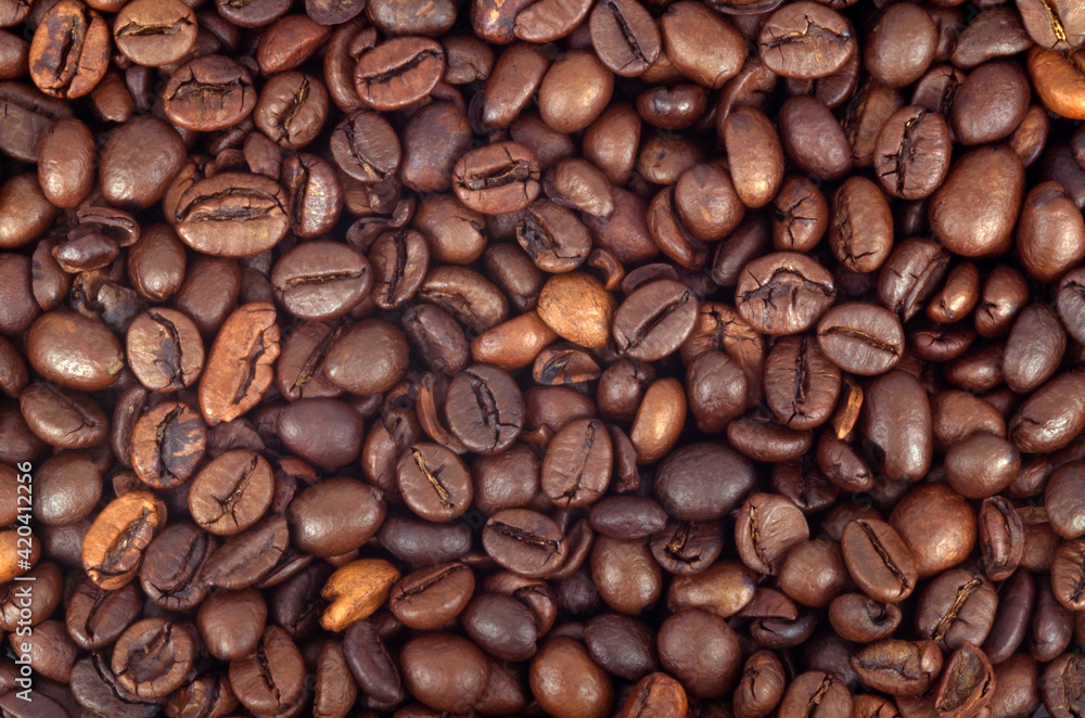 Roasted coffee beans background closeup Roasted coffee beans background closeup