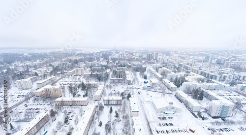 Obraz na płótnie Aerial panoramic view of Matinkyla neighborhood of Espoo, Finland. Snow-covered city in winter. w salonie