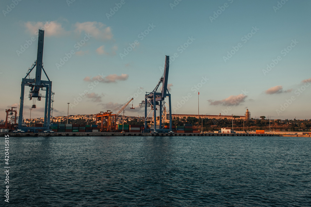 Constructions and cranes in cargo port near sea in Istanbul, Turkey