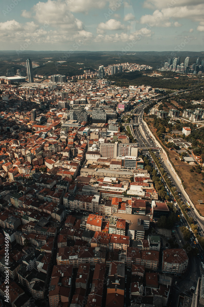 Aerial view of cityscape with cloudy sky at background, Istanbul, Turkey