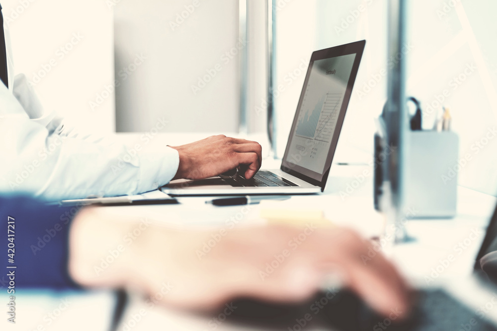 close up. business man typing on a laptop. close up. business man typing on a laptop.