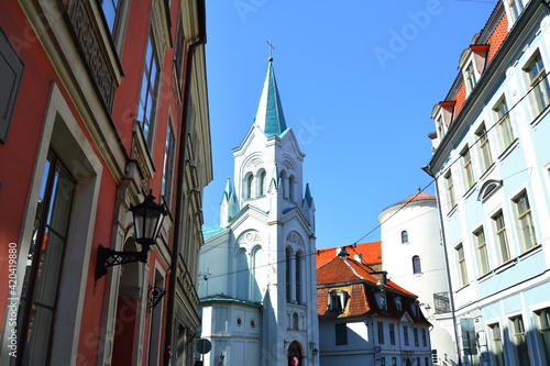 Our Lady of Sorrows Church (Latvian: Sapju Dievmates Romas katolu baznica) is a Roman Catholic church in the Old Town of Riga in a sunny day. Latvia, Baltic States. photo