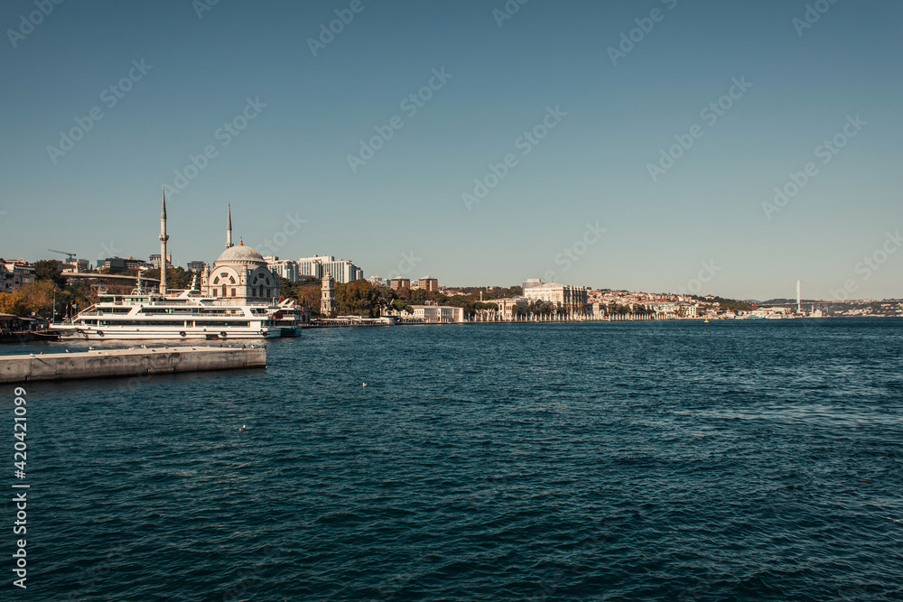 view of seafront with moored ships in Istanbul, Turkey