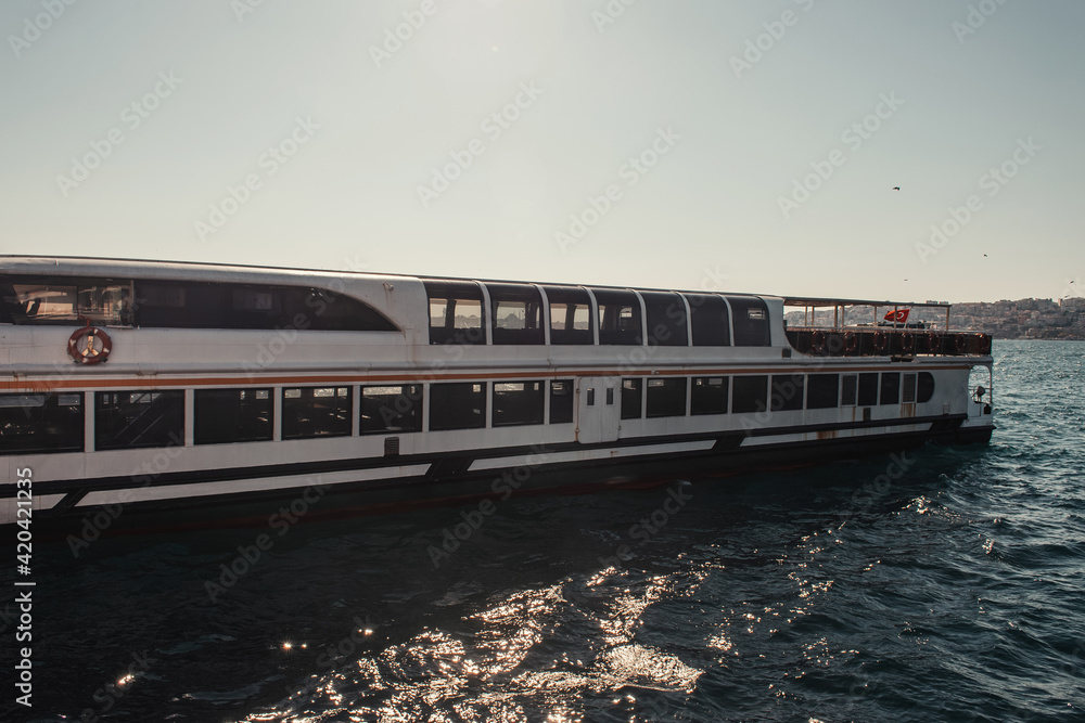 Fototapeta premium moored touristic ship in Bosphorus strait, Istanbul, Turkey