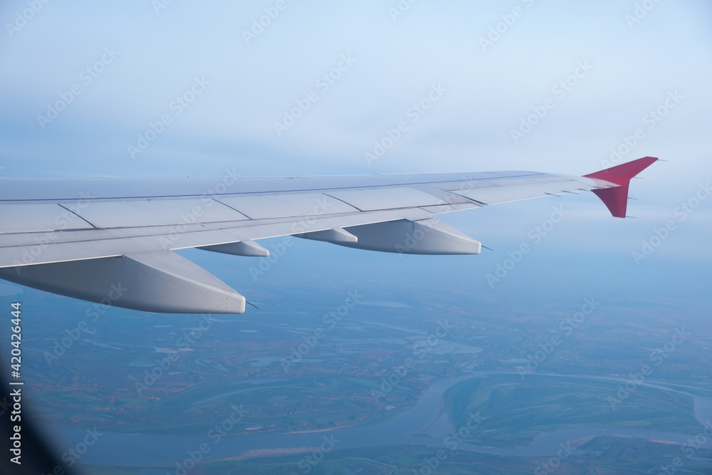 airplane flying view from inside window aircraft of Traveling airplane flying view from inside window aircraft of Traveling