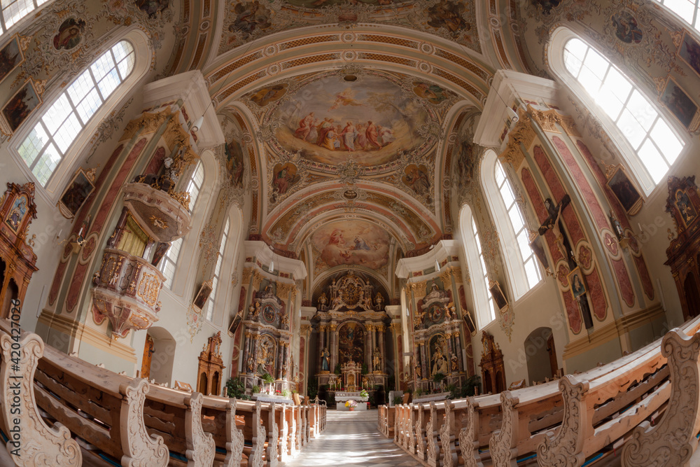 VAL DI FUNES, ITALY - SEPTEMBER 23, 2017: Internal wide view of the St. Peter church in Val di Funes, the main church in the valley