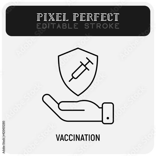 Coronavirus vaccination. Virus protection: human hand is holding shield with syringe. Immune system. Thin line icon. Pixel perfect, editable stroke. vector illustration.