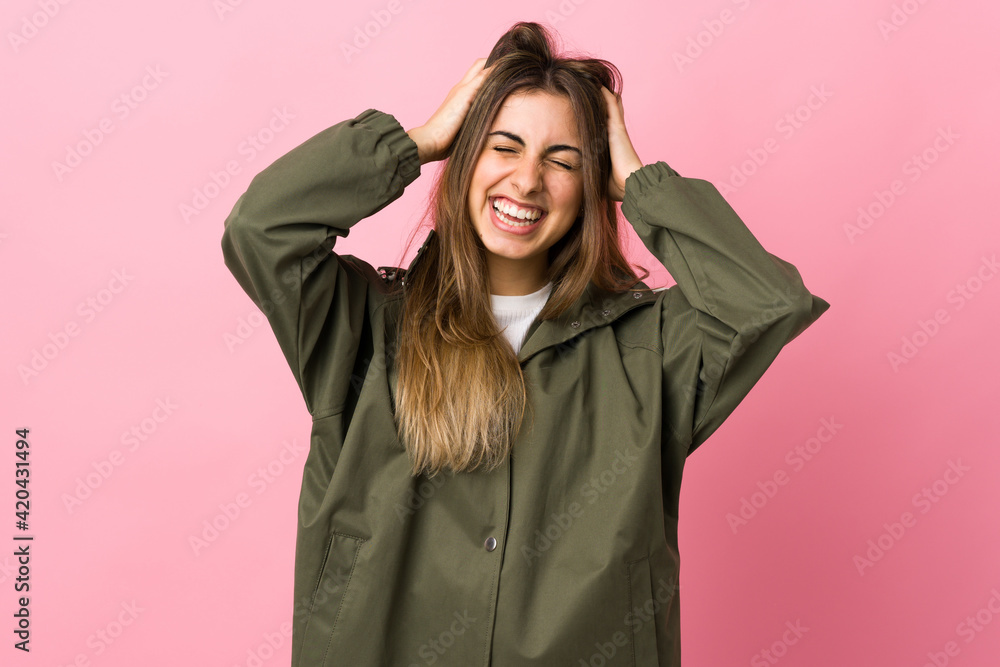 Young woman over isolated pink background laughing Young woman over isolated pink background laughing