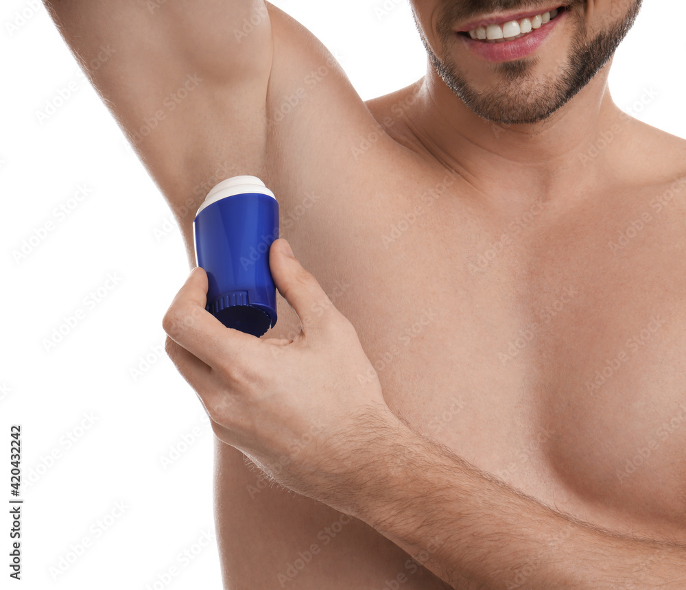 Naklejka premium Man applying deodorant isolated on white, closeup