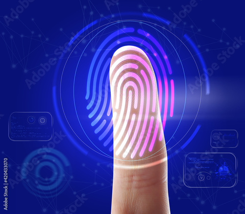Man using biometric fingerprint scanner on blue background, closeup