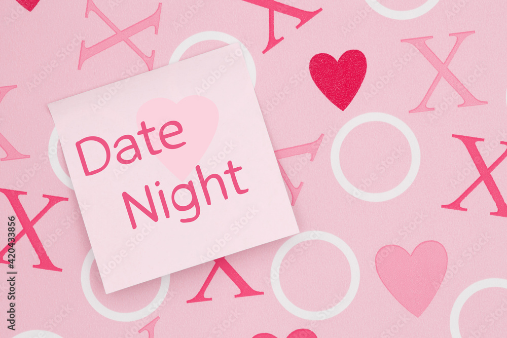 Date night message on a sticky note