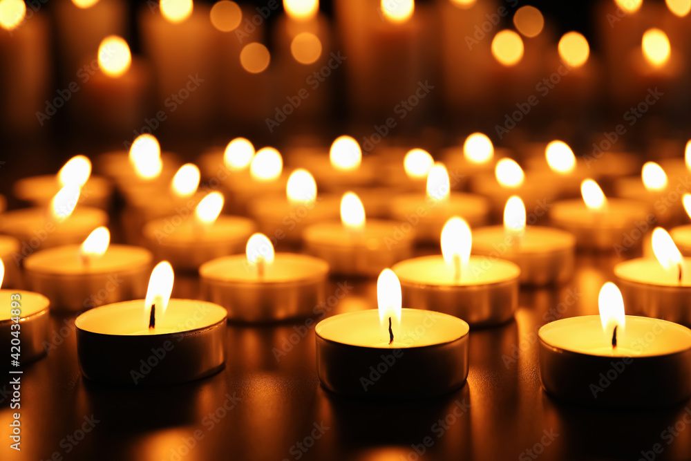 Many burning candles on table. Memory day Many burning candles on table. Memory day