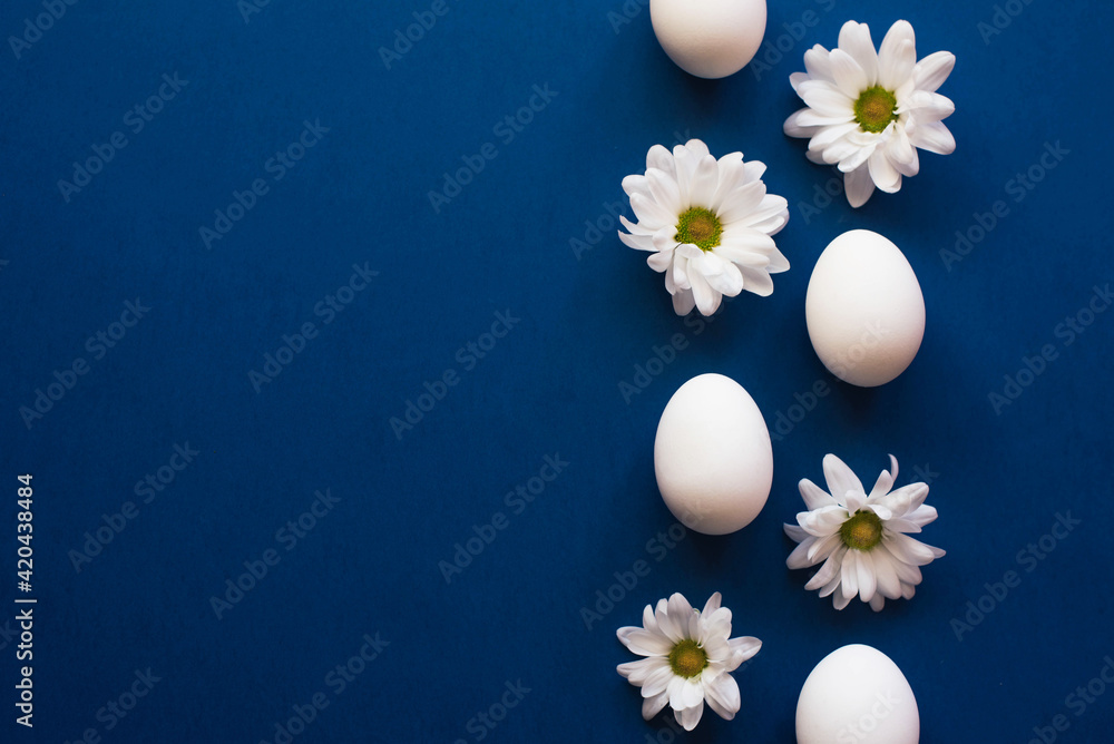 Beautiful easter composition on trendy classic blue background.