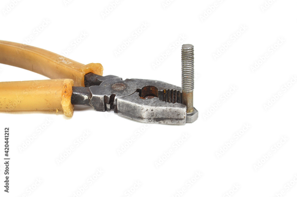Old rusty pliers on a white background close-up Old rusty pliers on a white background close-up