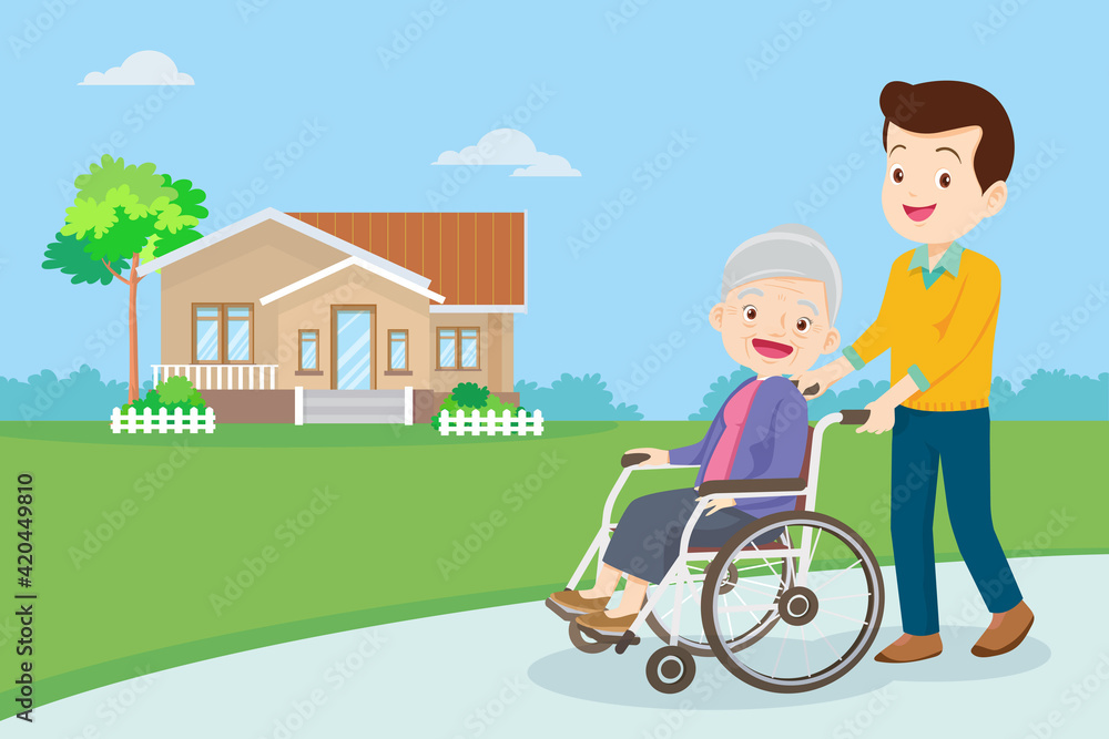 strolling with elderly woman in wheelchair in the park strolling with elderly woman in wheelchair in the park