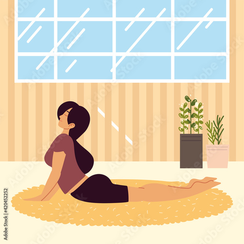 female practicing yoga