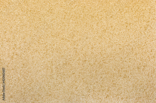 Sand plaster texture stucco wall yellow surface background