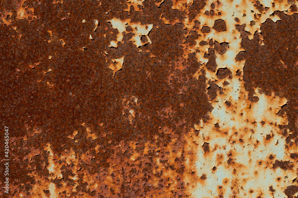 Textured grunge background red peeling paint with rust on old metal surface Textured grunge background red peeling paint with rust on old metal surface