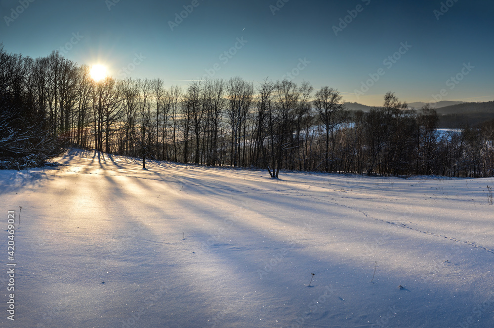 Shadows on the fresh snow in the winter time at Lower Silesia, Poland