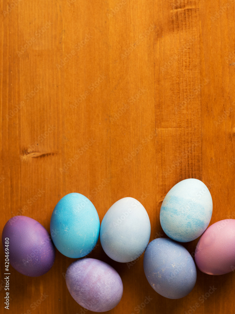 Easter eggs on a wooden table, copy space Easter eggs on a wooden table, copy space