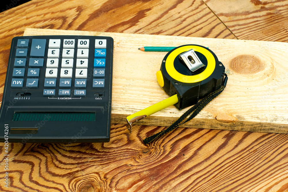 construction metertape measure calculator for calculations pencil and