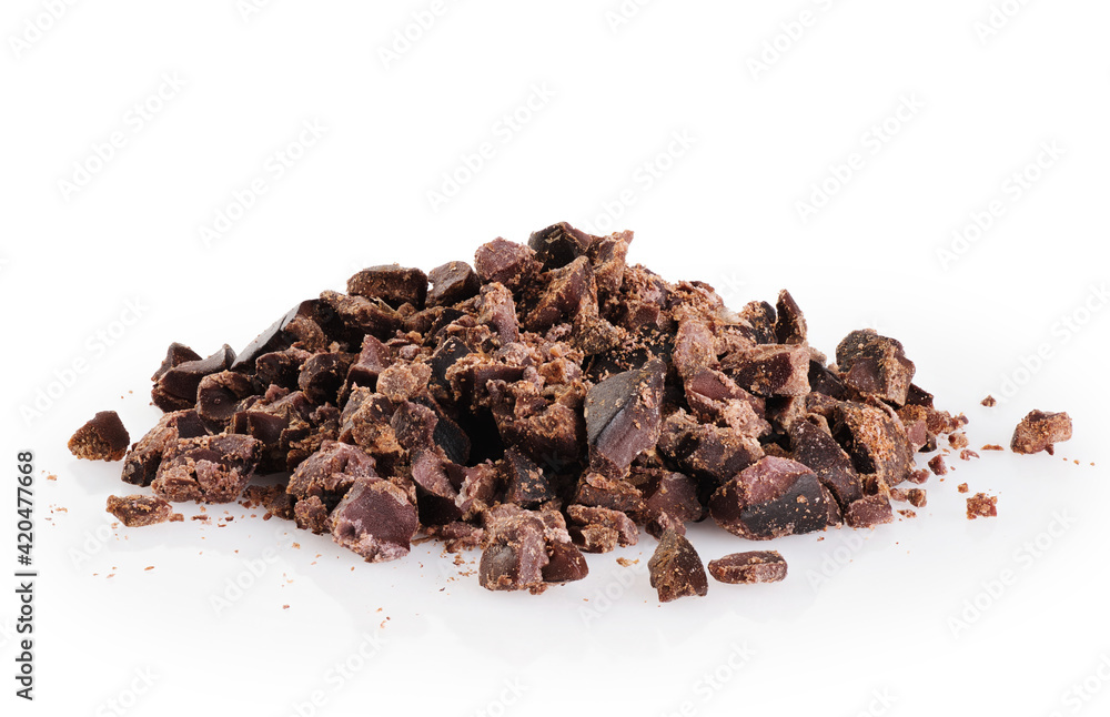 Chopped cocoa beans isolated on white background. Chopped cocoa beans isolated on white background.