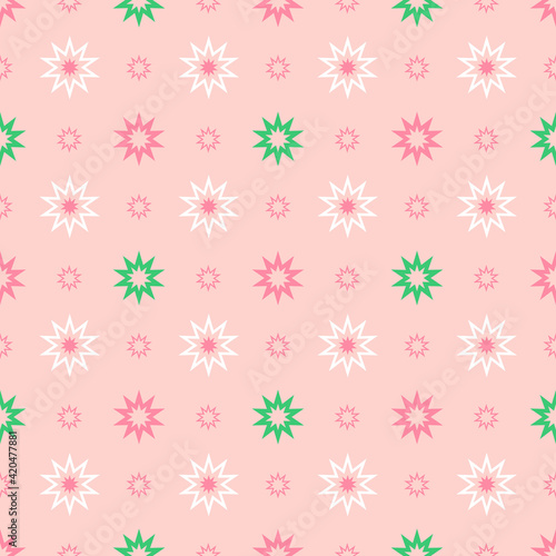 White pink and green stars seamless pattern vector repeating ornament on pastel pink background.Ideal for fabrics textile wrapping papers wallpapers scrapbooking kids clothes other creative projects.