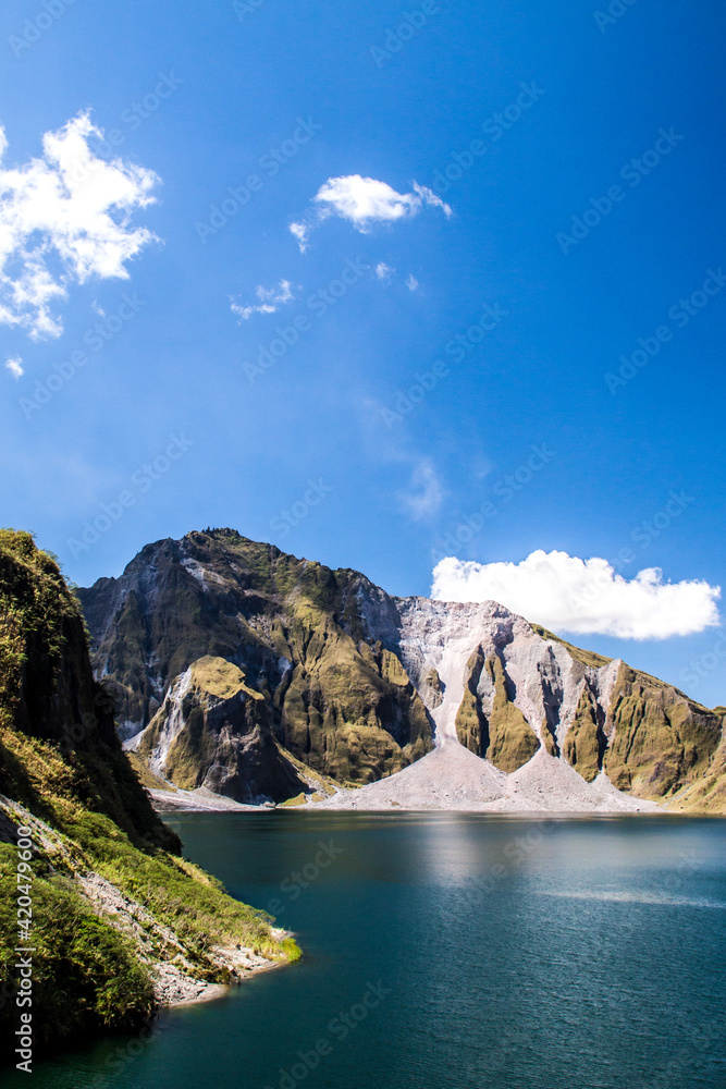 lake formed inside the crater of the volcano Mt. Pinatubo in Zambales, Philippines. Its eruption during the early 1990's was one of the most powerful in the world. lake formed inside the crater of the volcano Mt. Pinatubo in Zambales, Philippines. Its eruption during the early 1990's was one of the most powerful in the world.