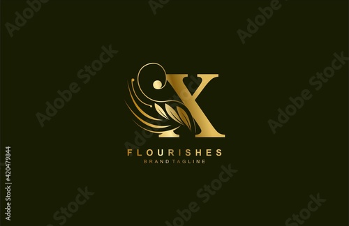 lowercase letter x linked beauty flourish golden color logo design