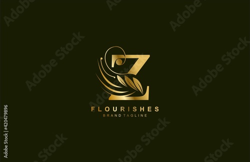 lowercase letter z linked beauty flourish golden color logo design photo