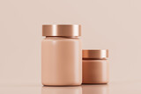 Two cosmetic bottles. Cream or lotion. Blank Label. Pink background. Spa concept. Mockups. Copy space.