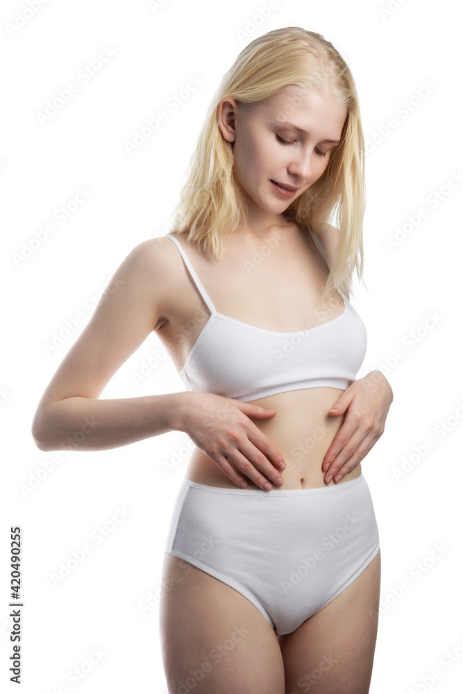 Slim tanned woman body over gray background Slim tanned woman body over gray background