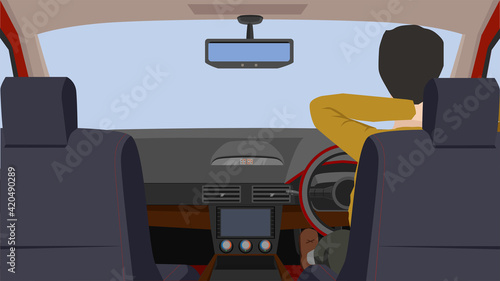 Driving man sat in the car, put his arms around his neck in a comfortable mood. Interior view of the passenger car with the entire console.  Take a break or wait during traffic jams.