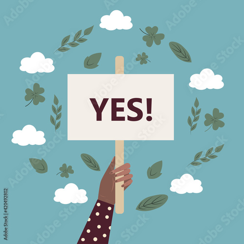 Vector cartoon illustration of human hand holding YES! sign banner. demonstration of dissent. Flat vector illustration.