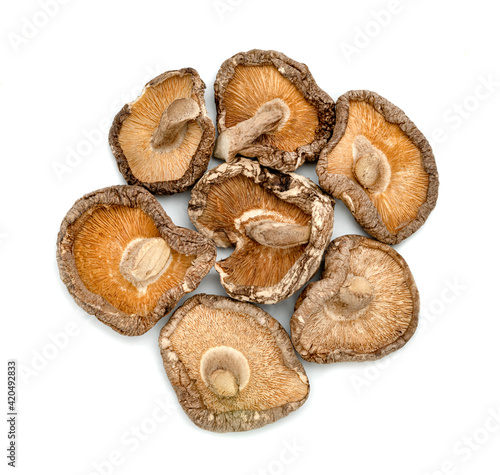 dry shiitake mushrooms isolated on white background