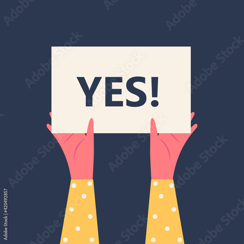Vector cartoon illustration of human hand holding YES! sign banner. demonstration of dissent. Flat vector illustration.