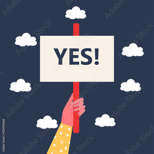 Vector cartoon illustration of human hand holding YES! sign banner. demonstration of dissent. Flat vector illustration.