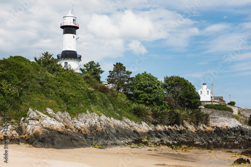 Lighthouse on the beach photo