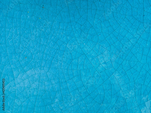 texture of cracked blue ceramic for background