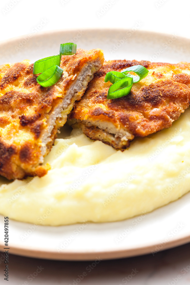 pork schnitzel with mashed potatoes