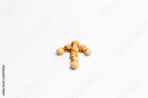 Close up of a handful of nuts isolated © LilianC