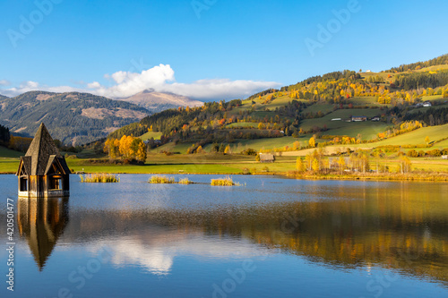 autumn pond under the mountains, Murau district,.Styria, Austria