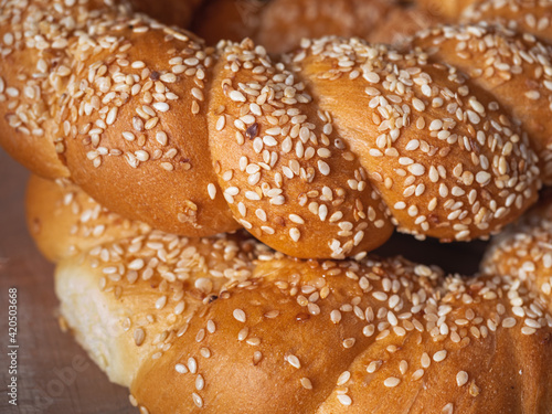 Sweet sweet rolls with sesame seeds for morning breakfast