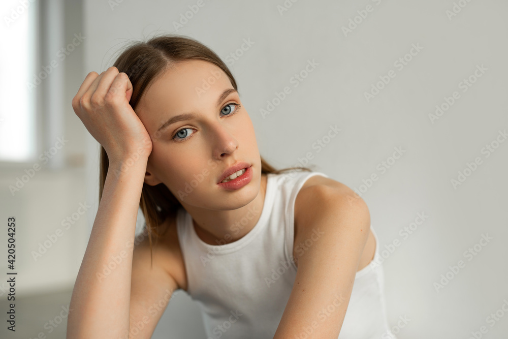 portrait of a beautiful young woman in sportswear portrait of a beautiful young woman in sportswear