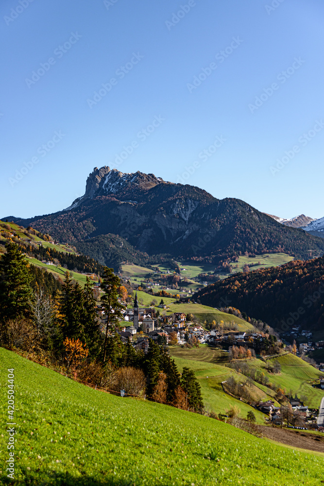 Landscape of a valley in south tyrol in the world natural heritage funes in the dolomites in autumn Landscape of a valley in south tyrol in the world natural heritage funes in the dolomites in autumn