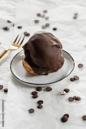 Bossche Bollen cake dutch ball of chocolate with whipped cream photo