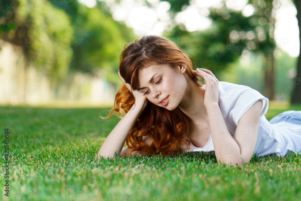pretty woman lying on the lawn rest charm fresh air pretty woman lying on the lawn rest charm fresh air