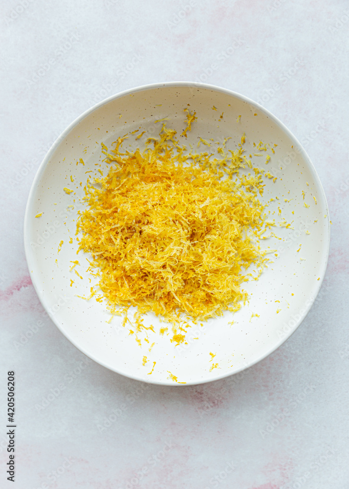 Lemon zest in ceramic bowl Lemon zest in ceramic bowl