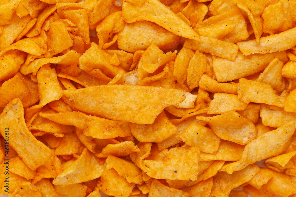 Close-up of Soya Chips crunchy and salty Indian Namkeen Full-Frame Background. Top View Close-up of Soya Chips crunchy and salty Indian Namkeen Full-Frame Background. Top View