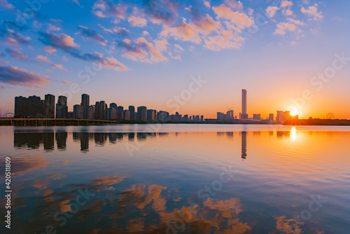 sunset over the city or lake © huhu123